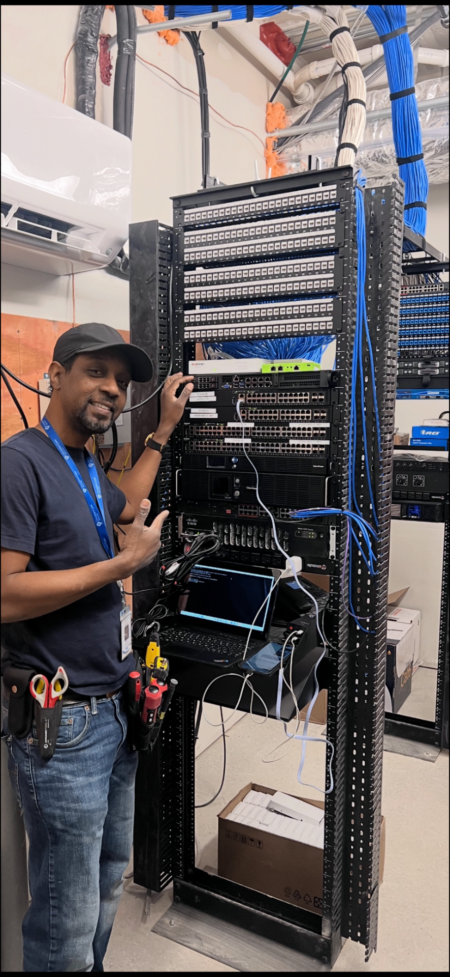 Stephen Cox working on a server rack